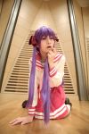  cosplay hair_ribbons hiiragi_kagami lucky_star naito photo purple_hair sailor_uniform school_uniform socks twintails 