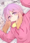  1girl arm_up bangs bed_sheet blush brown_hair closed_mouth commentary damaged drawstring eyebrows_visible_through_hair gradient_hair hair_between_eyes hair_ornament hairclip hand_up highres kantai_collection long_hair long_sleeves looking_at_viewer lying multicolored_hair on_back pill pink_sweater puffy_long_sleeves puffy_sleeves purple_hair ridy_(ri_sui) scissors shirt sleeves_past_wrists solo stuffed_animal stuffed_bunny stuffed_toy sweater symbol_commentary tsushima_(kancolle) upper_body violet_eyes yellow_shirt 