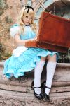  alice_(character) alice_in_wonderland apron blonde_hair cosplay hair_ribbons kipi-san photo socks 