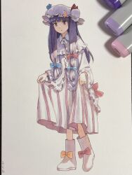  1girl art_tools_in_frame blue_bow blunt_bangs boots bow closed_mouth commentary crescent crescent_hair_ornament crescent_hat_ornament crescent_pin dot_nose dress footwear_bow frilled_sleeves frills full_body hair_bow hair_ornament hat hat_ornament heel_up highres holding_own_dress layered_dress long_hair long_sidelocks long_sleeves looking_at_viewer marker_(medium) mob_cap multiple_hair_bows patchouli_knowledge photo_(medium) pink_dress purple_hair purple_hat red_bow shiratama_(hockey) sidelocks simple_background solo standing striped_clothes striped_dress touhou traditional_media vertical-striped_clothes vertical-striped_dress violet_eyes white_background white_boots yellow_bow 