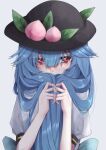  1girl blue_hair fall_dommmmmer food fruit hat highres hinanawi_tenshi long_hair looking_at_viewer peach red_eyes solo touhou 