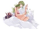  1girl bare_shoulders bed bed_sheet blush collarbone english_commentary green_eyes green_hair head_tilt highres holding holding_pillow long_hair looking_at_viewer older on_bed pillow pink_nightgown pointy_ears sakuremi simple_background sitting sitting_on_bed solo stuffed_animal stuffed_toy tiki_(fire_emblem) waving wavy_hair white_background 