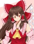  1girl absurdres ascot bangs bow brown_hair closed_mouth dated detached_sleeves eyebrows_visible_through_hair frilled_bow frilled_hair_tubes frills gohei hair_bow hair_tubes hakurei_reimu highres holding long_hair looking_at_viewer natch_imaycz nontraditional_miko pink_background red_bow red_eyes red_ribbon red_shirt ribbon ribbon-trimmed_sleeves ribbon_trim shide shirt sidelocks signature smile solo standing touhou upper_body wide_sleeves yellow_neckwear 