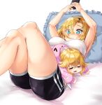  2girls bed black_shorts blonde_hair blue_eyes blush cellphone colored_skin crossed_legs cushion future_princess guardian_tales hand_up highres kiwoseo_meogneundas little_princess_(guardian_tales) multiple_girls open_mouth phone short_hair shorts sleeping smartphone white_skin 