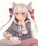  1girl amatsukaze_(kancolle) blush brown_eyes collarbone cup eyebrows_visible_through_hair grey_hoodie grey_jacket hair_between_eyes hair_tubes hand_on_own_face highres hood hoodie jacket kantai_collection kasumi_(skchkko) long_hair long_sleeves official_alternate_costume open_mouth silver_hair smile solo two_side_up white_background windsock 