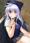  1girl alternate_costume bench blue_eyes blue_headwear blue_vest blush breasts commentary_request contemporary eris_(konosuba) eyebrows_visible_through_hair from_side green_neckwear grey_hair grey_skirt hair_between_eyes hand_up hat highres index_finger_raised izawa_koushi kono_subarashii_sekai_ni_shukufuku_wo! large_breasts long_hair looking_at_viewer miniskirt necktie outdoors pleated_skirt school_uniform shirt short_sleeves sitting skirt smile solo vest violet_eyes 