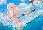  1girl absurdres animal bare_arms bare_shoulders bikini bird blue_sky breasts cirilla clouds commentary_request day fish flock hair_ornament highres long_hair looking_at_viewer medium_breasts navel ocean original outdoors partially_submerged red_eyes scenery seagull see-through silver_hair sky smile solo standing stomach sunlight swimsuit wading water water_drop white_bikini white_hair 