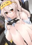  1girl armchair ayanami_(azur_lane) azur_lane bangs blurry chair collarbone commentary_request controller depth_of_field dualshock eyebrows_visible_through_hair eyes_visible_through_hair eyewear_on_head game_controller gamepad holding holding_controller holding_game_controller leaning_forward legs_together long_hair looking_at_viewer ootani_nonno orange_eyes oversized_clothes oversized_shirt playstation_controller ponytail retrofit_(azur_lane) shirt sidelocks silver_hair sitting solo t-shirt white_shirt 