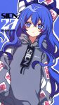  1girl blue_background blue_bow blue_eyes blue_hair bow character_name closed_mouth clothes_writing eyebrows_visible_through_hair flaming_eye frown grey_hoodie hair_between_eyes hair_bow heart highres hood hoodie kyouda_suzuka long_hair long_sleeves looking_at_viewer ofuda_on_clothes simple_background sleeves_past_fingers sleeves_past_wrists solo standing touhou twitter_username typo yorigami_shion 
