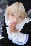  apron blonde_hair cosplay hair_bow maid maid_uniform photo striped_kneehighs 