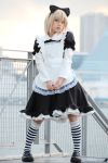  apron cosplay hair_bow maid maid_uniform photo scary_eyes striped_kneehighs 