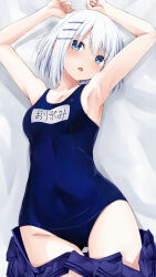   1girl arms_up bed blue_eyes blush breasts commentary_request date_a_live hair_ornament hairclip highres indoors iwashi_dorobou_-r- legs looking_at_viewer lying navy_swimsuit on_back one-piece_swimsuit pillow school_swimsuit short_hair small_breasts solo swimsuit thighs tobiichi_origami white_hair