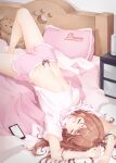  1girl absurdres bed belly brown_hair cellphone closed_eyes highres long_hair mame_(hyeon5117) navel original phone pillow pink_shorts shirt short_sleeves shorts sleeping smartphone solo stuffed_animal stuffed_toy teddy_bear white_shirt 