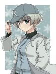  1girl adjusting_clothes adjusting_headwear bangs baseball_cap blue_background blue_eyes blue_headwear blue_jacket border closed_mouth coat commentary_request drawstring frown girls_und_panzer grey_hair hand_in_pocket hat jacket keizoku_military_uniform long_sleeves looking_at_viewer military military_uniform open_clothes open_coat outside_border partial_commentary raglan_sleeves short_hair snowflake_background solo spoilers standing takahashi_kurage track_jacket uniform upper_body white_border white_coat youko_(girls_und_panzer) 