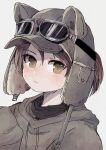  1girl alternate_costume animal_hat bangs blush brown_hair brown_headwear cat_hat closed_mouth goggles goggles_on_headwear grey_background hair_between_eyes hat highres hood hoodie jacket kantai_collection long_sleeves shikinami_(kancolle) simple_background sleeves_past_fingers sleeves_past_wrists solo tori_knkr upper_body yellow_eyes 