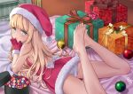  1girl aoi_kumiko ass bangs barefoot blonde_hair blue_eyes blush box breasts candy christmas dress feet food fur-trimmed_dress fur-trimmed_gloves fur-trimmed_headwear fur_trim gift gift_box gloves hat highres indoors long_hair looking_at_viewer lying on_stomach open_mouth original panties pantyshot red_dress red_gloves santa_costume santa_hat short_dress small_breasts solo toes underwear white_panties 