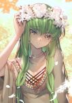 1girl adjusting_clothes adjusting_headwear bracelet c.c. code_geass creayus eyebrows_visible_through_hair flower green_hair head_wreath jewelry long_hair loose_clothes necklace petals smile very_long_hair yellow_eyes 