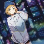  1girl black_shorts blonde_hair blue_headwear blurry blurry_background bob_cut building cowboy_shot dutch_angle eyebrows_visible_through_hair green_eyes hand_in_hair highres hood hoodie knit_hat looking_at_viewer night original outdoors piroshiki123 short_shorts shorts smile solo white_hoodie 