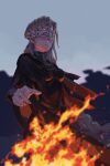  1girl bangs blindfold blonde_hair blurry blurry_background breasts cape capelet cloak closed_mouth covered_eyes cowboy_shot dark_souls_iii dress english_commentary fire fire_keeper frown highres jewelry jiro_(ninetysix) long_hair mask necklace solo souls_(from_software) 