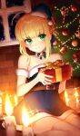  1girl ahoge artoria_pendragon_(all) bare_shoulders bell belt blonde_hair blue_bow blue_dress blue_headwear blush bow box braid candle candy candy_cane choker christmas christmas_tree closed_mouth commentary craft_essence dress fate/grand_order fate_(series) food french_braid gift gift_box green_eyes hair_bun hat holding holding_gift looking_at_viewer official_art present_for_my_master saber sakura_yuki_(clochette) santa_costume santa_hat short_dress short_hair sitting smile solo thigh-highs wariza white_legwear white_neckwear window zettai_ryouiki 