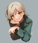  1girl bangs blonde_hair closed_mouth commentary_request cropped_torso eyebrows_visible_through_hair fingernails green_sweater grey_background hair_behind_ear hand_on_own_cheek hand_on_own_face hands_up head_rest highres light_blush long_sleeves looking_at_viewer okeno_kamoku orange_eyes original parted_bangs short_hair signature simple_background smile solo sweater upper_body 