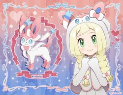  1girl akika_821 artist_name bangs blonde_hair blush bow braid character_name closed_mouth eyelashes framed gen_6_pokemon green_eyes hair_bow hands_together hands_up head_tilt hood hood_up lillie_(pokemon) looking_at_viewer pokemon pokemon_(anime) pokemon_ears pokemon_sm_(anime) poncho shiny shiny_hair smile sylveon twin_braids upper_body 