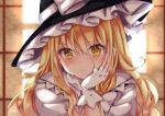 1girl bangs black_headwear blonde_hair blush bow closed_mouth eyebrows_visible_through_hair fingerless_gloves frilled_hat frills gloves hand_on_own_face hat hat_bow indoors kirisame_marisa looking_at_viewer nanase_nao solo touhou upper_body white_bow white_gloves window witch_hat yellow_eyes 