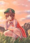  1girl :p animal_ears bangs blurry blush bow bowtie brown_eyes brown_hair cat_ears cat_tail chen clouds cloudy_sky commentary_request depth_of_field dress eyebrows_visible_through_hair flat_chest forneus_0 full_body gold_trim grass green_headwear hair_between_eyes hand_up hat highres jewelry licking long_sleeves looking_at_viewer mob_cap multiple_tails nekomata outdoors paw_pose petticoat red_dress short_hair single_earring sky solo squatting tail tongue tongue_out touhou twilight two_tails white_bow white_neckwear 