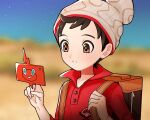 1boy amakara000 beanie blurry blurry_background brown_eyes brown_hair buttons cable_knit gen_4_pokemon grey_headwear hands_up hat highres holding_strap male_focus parted_lips pokemon pokemon_(game) pokemon_swsh red_shirt rotom rotom_phone shirt short_hair sleeves_rolled_up suitcase upper_body victor_(pokemon) 