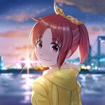  1girl abe_nana bangs blurry blurry_background brown_eyes brown_hair clouds cloudy_sky from_behind highres hood hood_down idolmaster idolmaster_cinderella_girls idolmaster_cinderella_girls_starlight_stage jacket looking_at_viewer looking_back parted_bangs sidelocks sinohira_rin sky smile solo upper_body yellow_jacket 