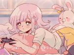  1girl :o bangs black_legwear blush bow brown_skirt criis-chan dangan_ronpa_(series) dangan_ronpa_2:_goodbye_despair diaper ear_bow english_commentary eyebrows_visible_through_hair flipped_hair hair_ornament hairclip heart holding lying medium_hair monomi_(dangan_ronpa) nanami_chiaki on_bed on_stomach open_mouth orange_bow pillow pink_hair playing_games playstation_controller shiny shiny_hair shirt short_sleeves skirt thigh-highs upper_teeth white_shirt 