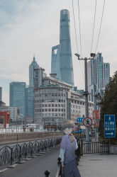  1girl absurdres black_pants blue_eyes bob_cut bubble_tea building casual china chinese_text city drinking drinking_straw english_text grey_hair highres jinmao_tower love_live! love_live!_superstar!! mixed_media outdoors overcast pants photo_(medium) photo_background power_lines purple_shirt real_world_location senkun shanghai shanghai_tower shanghai_world_financial_center shirt sky skyscraper tang_keke 