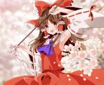  1girl :d arm_up armpits ascot bangs blurry blurry_background blush bow breasts brown_hair cherry_blossoms commentary cowboy_shot day detached_sleeves eyebrows_visible_through_hair frills gohei hair_bow hair_tubes hakurei_reimu holding large_bow long_hair looking_at_viewer nontraditional_miko okawa_friend open_mouth outdoors parted_bangs petals purple_neckwear red_bow red_eyes red_skirt skirt small_breasts smile solo touhou wide_sleeves wind 