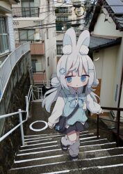  1girl :o animal_ear_fluff animal_ears black_shoes black_skirt blue_bow blue_eyes blush bow building collared_shirt commentary double_bun dress_shirt grey_hair hair_bun hair_ornament hairclip highres long_hair loose_socks low_twintails nakkar original outdoors parted_lips plaid_bow pleated_skirt rabbit_ears railing shirt shoes skirt socks solo stairs stone_stairs sweater_vest twintails untranslatable_commentary walking white_shirt white_socks window 