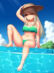  1girl ;3 arm_up artist_name bare_legs bare_shoulders barefoot bikini blue_sky breasts clouds commentary commission day eyebrows_visible_through_hair eyes_visible_through_hair feet full_body green_bikini hand_on_headwear hat kuroonehalf long_hair looking_at_viewer medium_breasts navel one_eye_closed original outdoors platinum_blonde_hair pool red_eyes side-tie_bikini sitting sky smile solo sun_hat swimsuit toes water 
