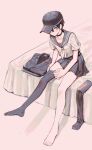  1boy 50k_v3 bangs barefoot black_choker black_hair black_headwear blush brown_eyes choker collarbone dangan_ronpa_(series) dangan_ronpa_v3:_killing_harmony dressing grey_background highres jacket looking_at_viewer no_shoes on_bed parted_lips pleated_skirt saihara_shuuichi sailor_collar school_uniform serafuku shirt short_hair single_thighhigh sitting skirt solo thigh-highs thighhighs_removed white_shirt 