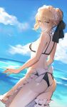  1girl absurdres apron artoria_pendragon_(all) artoria_pendragon_(alter_swimsuit_rider)_(fate) ass back bangs bare_shoulders bikini black_bikini black_ribbon blonde_hair blue_sky blush braid breasts choker fate/grand_order fate_(series) french_braid frilled_choker frills hair_bun hair_ribbon hana3901 highres huge_filesize leg_garter long_hair looking_at_viewer looking_back maid_bikini maid_headdress ocean ribbon sidelocks sky small_breasts swimsuit thighs waist_apron white_apron yellow_eyes 