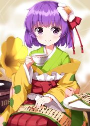  1girl blush calligraphy_brush closed_mouth commentary cup floral_print floral_print_kimono flower green_kimono hair_flower hair_ornament hakama hakama_skirt hieda_no_akyuu highres holding holding_cup japanese_clothes kimono layered_kimono long_sleeves looking_at_viewer paintbrush phonograph print_kimono purple_hair red_hakama ruu_(tksymkw) scroll seiza short_hair sitting skirt smile solo tea teacup touhou violet_eyes wide_sleeves yellow_kimono 