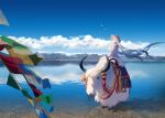  1girl absurdly_long_hair absurdres aqua_hair beach bird blue_sky chinese_commentary closed_eyes clouds commentary day dress flower hat hat_flower hatsune_miku highres horns lake long_hair mountainous_horizon neck_ribbon outdoors reflection ribbon riding scenery sitting sky smile string_of_flags tassel twintails very_long_hair vocaloid white_dress wide_shot yak yellow_neckwear yukiko_(snow_boy) 