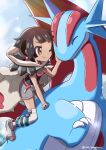  1girl ;) anklet bangs belt black_hair black_shirt boots brown_eyes cloak closed_mouth commentary day earrings eyelashes gen_3_pokemon grey_footwear grey_shorts jewelry one_eye_closed outdoors over-kneehighs pokemon pokemon_(creature) pokemon_(game) pokemon_oras red_belt rope_belt saki_pokeoekaki salamence shirt short_shorts shorts smile thigh-highs toeless_footwear twitter_username white_legwear zinnia_(pokemon) 