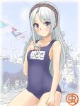  1girl artist_logo black_hairband blue_swimsuit cowboy_shot flat_chest hairband hand_on_own_chest kantai_collection long_hair looking_at_viewer mushi_mushi_ex name_tag sagiri_(kancolle) school_uniform silver_hair solo swimsuit violet_eyes 