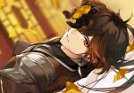  1boy bed_sheet black_gloves brown_hair covering_one_eye earrings genshin_impact gloves hair_over_one_eye highres jewelry kanengomi leaf long_hair long_sleeves lying on_back parted_lips ponytail twitter_username yellow_eyes zhongli_(genshin_impact) 