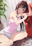  1girl :d absurdres arm_support bangs bare_legs black_hair blunt_bangs blush breasts camisole couch dutch_angle eyebrows_visible_through_hair green_eyes grey_shorts grin highres indoors kurosawa_dia long_hair looking_at_viewer love_live! love_live!_sunshine!! mole mole_under_mouth on_floor open_mouth shorts sitting sleeveless small_breasts smile solo strapless yamaori_(yamaorimon) yokozuwari 