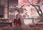  1girl absurdres animal_ears architecture cherry_blossoms east_asian_architecture fox_ears highres homu_(honkai_impact) honkai_(series) honkai_impact_3rd huge_filesize japanese_clothes kimono looking_at_viewer looking_back pink_hair seiza sitting solo table tree violet_eyes yae_sakura 