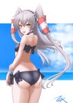  1girl amatsukaze_(kancolle) ass bikini black_bikini blue_sky brown_eyes clouds cowboy_shot from_behind hair_tubes highres horizon kantai_collection long_hair looking_at_viewer ocean side-tie_bikini silver_hair sky solo swimsuit t2r tongue tongue_out two_side_up windsock 