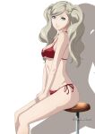  1girl bangs between_legs bikini blonde_hair blue_eyes breasts chair excaliblader hair_ornament hairclip hand_between_legs highres legs long_hair looking_at_viewer medium_breasts persona persona_5 red_bikini shadow side-tie_bikini simple_background sitting solo swept_bangs swimsuit takamaki_anne twintails twitter_username white_background 