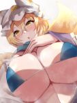  1girl :o bikini bikini_top blonde_hair blue_bikini breasts commentary_request fox_tail hair_between_eyes hat kurokan_(kokkyou_oudan) large_breasts looking_at_viewer multiple_tails open_mouth short_hair solo sweat swimsuit tail touhou upper_body white_headwear yakumo_ran yellow_eyes 