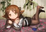  1girl animal_ears arknights black_bow black_legwear black_shorts blue_flower bow brown_eyes brown_hair buchi0122 commentary feet_up flower fox_ears hair_bow hanging_plant highres jacket legwear_under_shorts looking_at_viewer lying no_tail official_alternate_costume on_bed on_stomach pantyhose perfumer_(arknights) perfumer_(species_plantarum)_(arknights) petals short_hair shorts solo white_jacket 