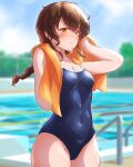  1girl alternate_costume arthur_ko blue_sky blue_swimsuit braid breasts brown_hair competition_school_swimsuit covered_navel cowboy_shot day highres kantai_collection long_hair one-piece_swimsuit orange_eyes orange_towel outdoors pool poolside school_swimsuit single_braid sky small_breasts solo souya_(kancolle) standing swimsuit 