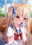  1girl absurdres animal_ear_fluff animal_ears bangs blue_bow blue_sailor_collar blue_skirt blurry blurry_background blush bow brown_eyes brown_hair cat_ears cat_girl cat_tail cellphone commentary_request covered_mouth depth_of_field eyebrows_visible_through_hair hair_between_eyes hair_bow heart heart_tail highres holding holding_phone indoors looking_at_viewer original phone pleated_skirt red_bow sailor_collar school_uniform serafuku short_sleeves skirt solo tail tail_raised tsukimiya_sara two_side_up 